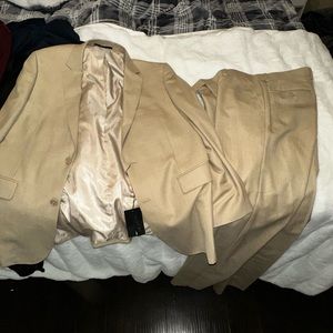 Tan suit never used !